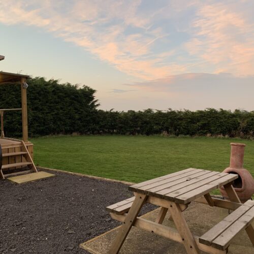 Shearling hut exterior picnic table